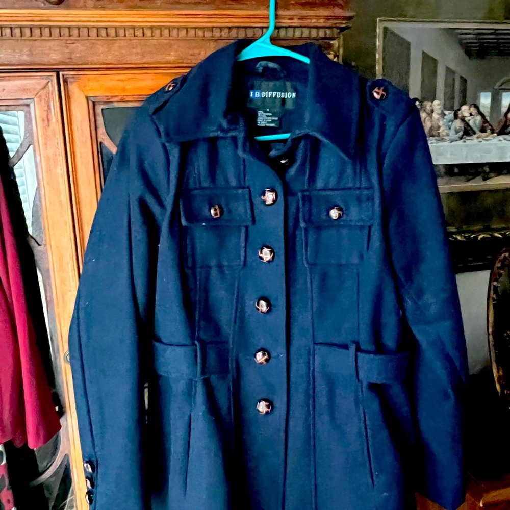 Pea coat. Nice dark blue. WArm and cute on those chilly days.